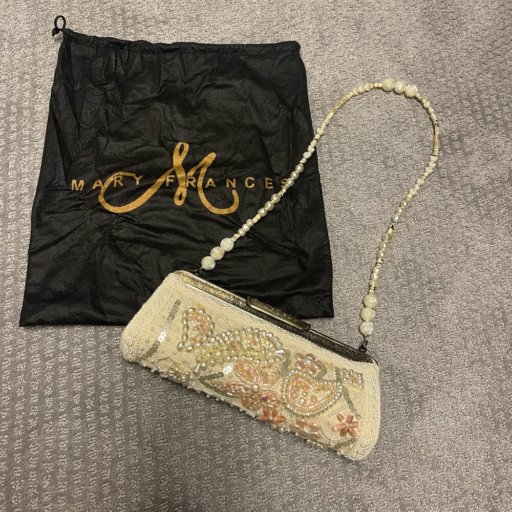 Mary Frances cream and gold clutch with pearl strap and dust bag.